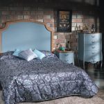 Dormitorio vintage color azul con cabecero clásico Dormitorio vintage color azul con cabecero clásico
