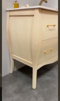 Mueble de baño vintage modelo Mosa en color hueso envejecido y tiradores en oro cepillado Mueble de baño vintage modelo Mosa en color hueso envejecido y tiradores en oro cepillado